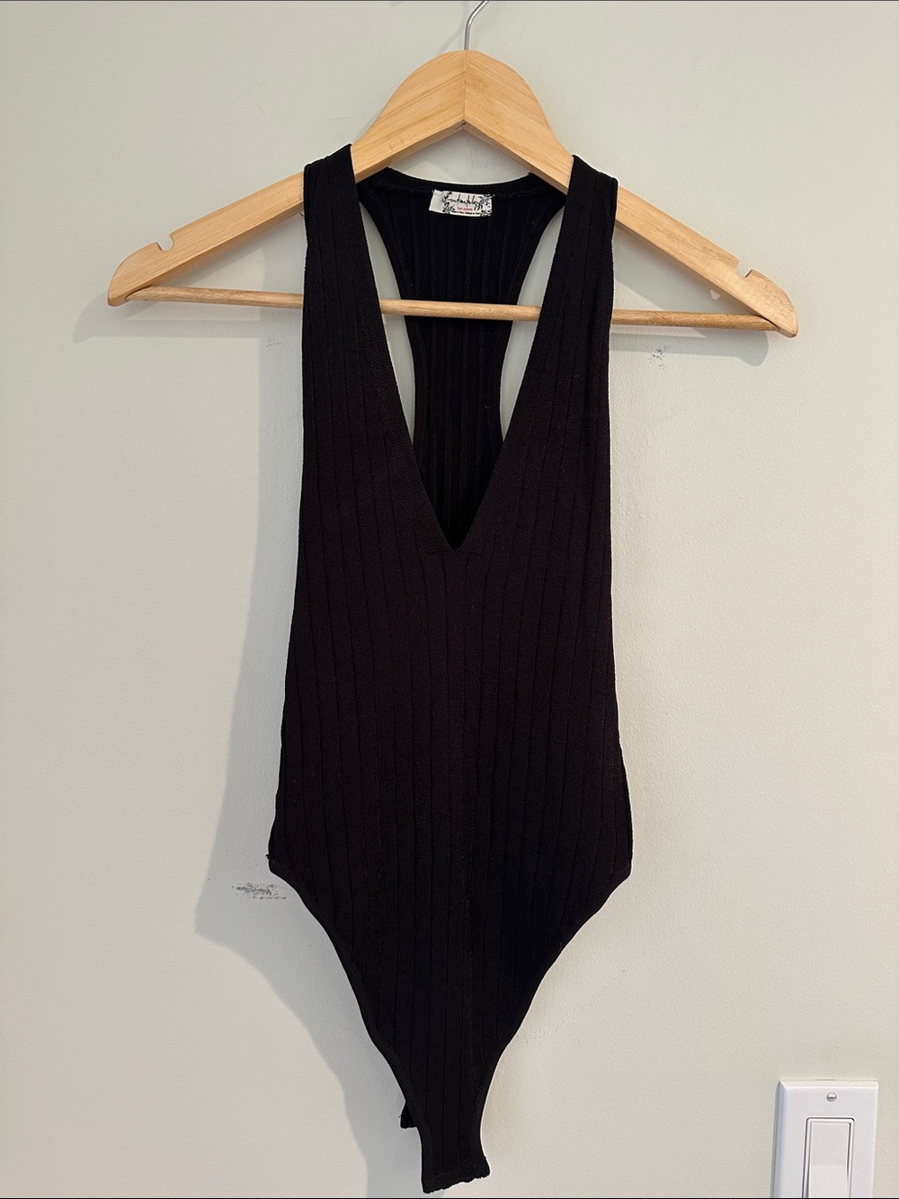 NWOT Free People Black Ribbed One-Piece Bodysuit, Snaps Under.